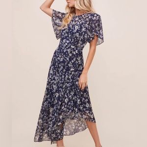 Never worn ASTR XS dress. Gorgeous gold threading beautiful navy floral print.